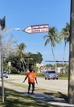Sign Spinners for Naples Leather Florida