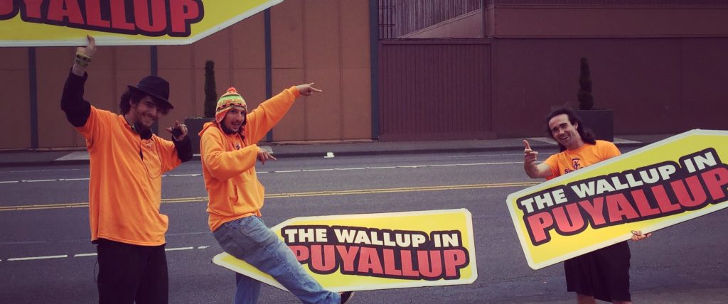Sign Spinner Ads Promotes “The Wallup in Puyallup”